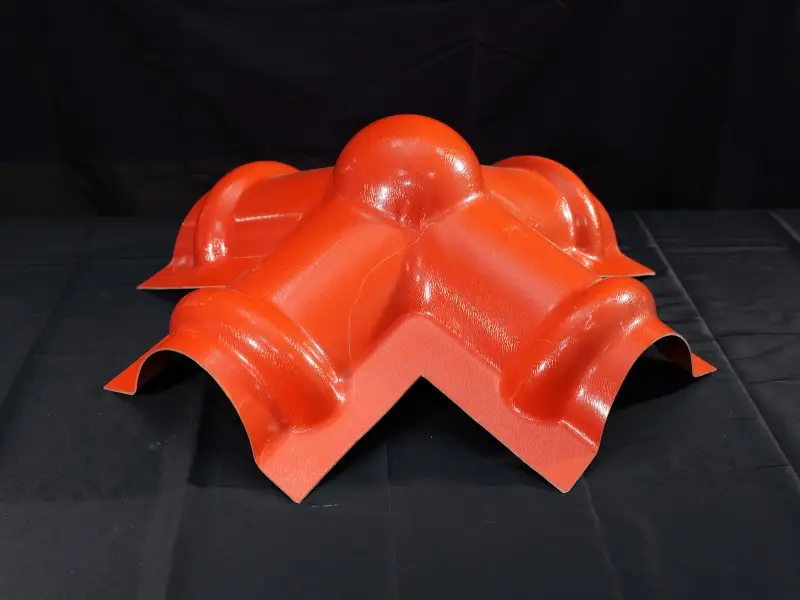 4-way ridge tile connector for a synthetic resin roof apex