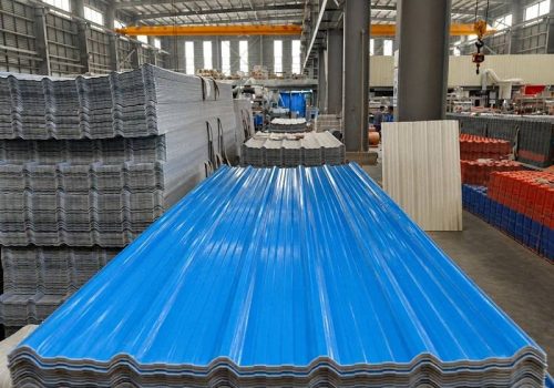 Stacks of corrugated plastic roofing sheets inside the HESU factory